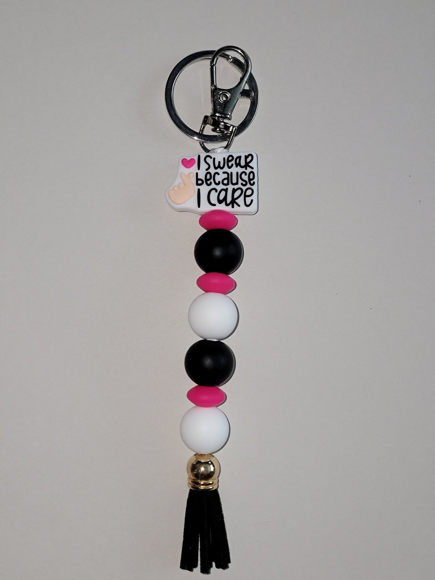 I Swear Because I Care Beaded Zipper Pull