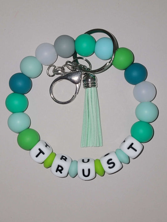 Teal Trust Beaded Wristlet