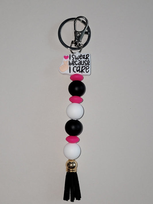 I Swear Because I Care Beaded Zipper Pull
